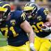 Running back Drake Johnson runs downfield during the Michigan spring football game on Saturday, April 13. AnnArbor.com I Daniel Brenner